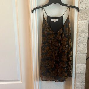 Minor flaw on back of strap, velvet tank top